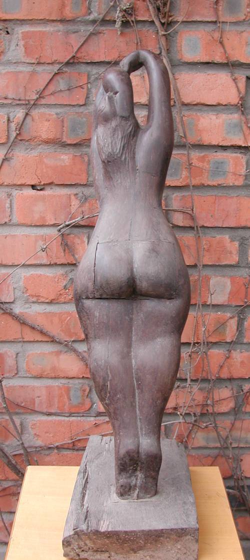 Morning - a sculpture of a woman stretching by Shen Xiaonan - back