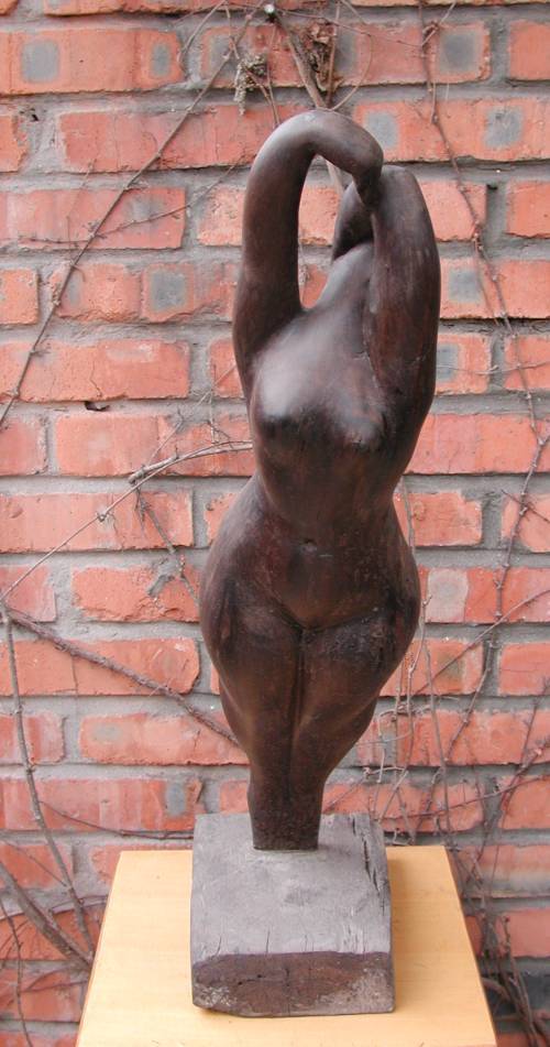 Morning - a sculpture of a woman stretching by Shen Xiaonan